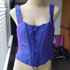 Size 9 zip on purple corset. Nwt.